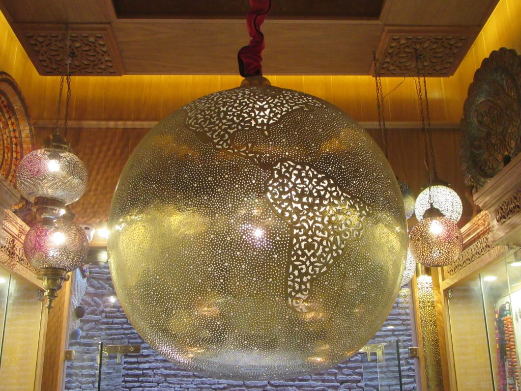 Big perforated metal globe in Medina Interior Design Shop